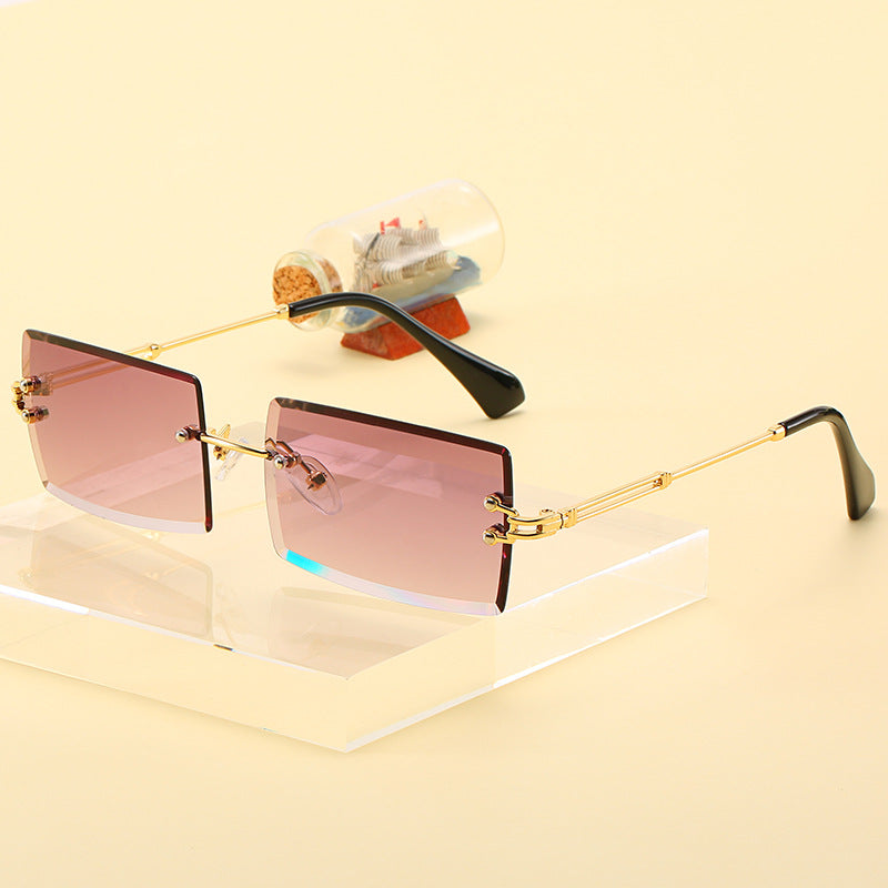 Gafas de sol cuadradas de borde de corte sin marco de PC al por mayor